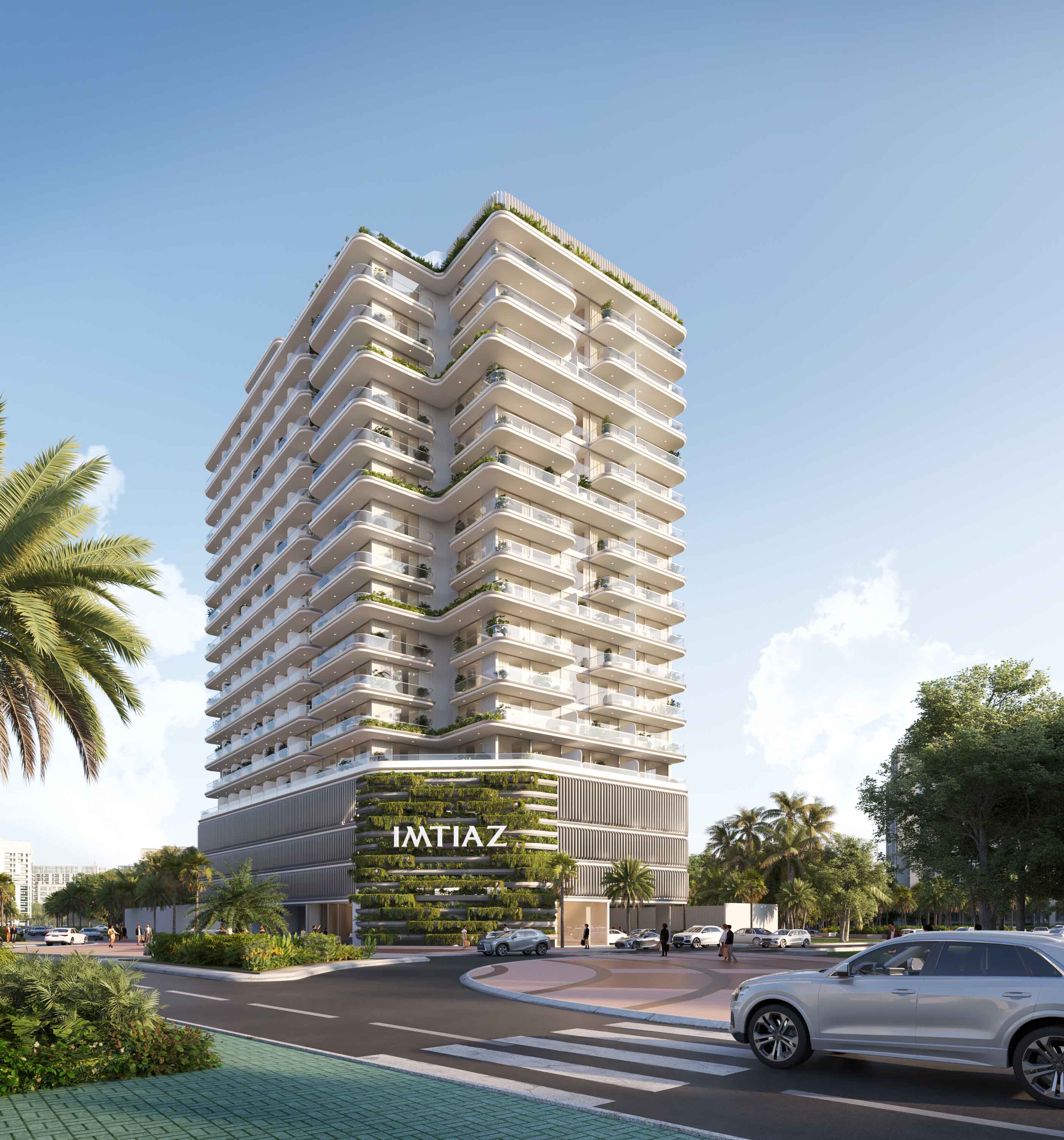 Cove Edition Iii By Imtiaz A modern multi-story building named "IMTIAZ" with green terraces, palm trees, and a clear blue sky.